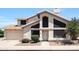 Charming stucco home with a two-car garage and well-maintained landscaping, perfect for Gathering living at 4210 W Rosemonte Dr, Glendale, AZ 85308
