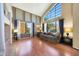 Inviting living room features large windows, neutral paint, and stylish decor, creating a cozy and elegant atmosphere at 4210 W Rosemonte Dr, Glendale, AZ 85308