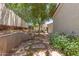 A stone walking path with foliage in a backyard at 4225 N 21St St # 22, Phoenix, AZ 85016