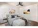 Cozy bedroom featuring a ceiling fan, modern art, and neutral tones at 4225 N 21St St # 22, Phoenix, AZ 85016
