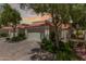 Charming single-story home with a two-car garage, a red tile roof, and well-maintained landscaping at 4225 N 21St St # 22, Phoenix, AZ 85016