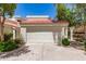 Spacious home's two car garage offers ample space and complements the home's architecture at 4225 N 21St St # 22, Phoenix, AZ 85016