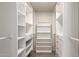 Bright walk-in closet with custom shelving and drawer units to maximize storage space at 4225 N 21St St # 22, Phoenix, AZ 85016