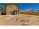 Spacious backyard featuring a covered patio and expansive area for customizing landscape at 45071 W Portabello Rd, Maricopa, AZ 85139