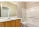Bathroom featuring a shower-tub combination and a wood vanity at 45071 W Portabello Rd, Maricopa, AZ 85139