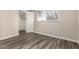 Bedroom with closet featuring white shelving, and a window for natural light at 520 N Stapley Dr # 257, Mesa, AZ 85203