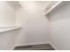 Walk-in closet with built-in white shelving at 520 N Stapley Dr # 257, Mesa, AZ 85203