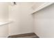 Walk-in closet with ample shelving, modern flooring, and great storage space at 520 N Stapley Dr # 257, Mesa, AZ 85203