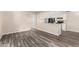 Open-concept floor plan featuring wood-style floors and combined living and kitchen space at 520 N Stapley Dr # 257, Mesa, AZ 85203