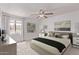 Serene bedroom with a comfortable bed, nightstands, and soft natural light from the window at 533 W Guadalupe Rd # 2126, Mesa, AZ 85210