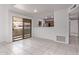Open layout dining area with sliding door access to the outdoors, adjacent to the kitchen at 533 W Guadalupe Rd # 2126, Mesa, AZ 85210