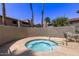 Inviting community hot tub surrounded by lush landscaping and privacy walls for a relaxing outdoor experience at 533 W Guadalupe Rd # 2126, Mesa, AZ 85210