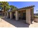 Poolside cabana with seating and amenities, offering a shaded retreat near the community pool at 533 W Guadalupe Rd # 2126, Mesa, AZ 85210