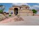 Stunning two-story home with a grand entrance, well-manicured landscaping, and attached garage at 5940 W Robinson Way, Chandler, AZ 85226