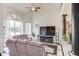 Open living room features tall ceilings, oversized windows, and an entertainment area at 5940 W Robinson Way, Chandler, AZ 85226