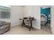 A flex space is currently being used as an office, featuring tile flooring at 607 W Tenia Trl, San Tan Valley, AZ 85140