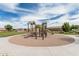 Well-maintained playground with multiple slides and climbing structures offers a safe and enjoyable play area for children at 607 W Tenia Trl, San Tan Valley, AZ 85140