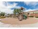 Modern playground with slides, climbing features, and a sand base offers a fun and safe environment for play at 607 W Tenia Trl, San Tan Valley, AZ 85140
