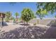 Backyard featuring desert landscaping providing a low-maintenance outdoor space, complemented by a patio set at 656 W Devon Ct, Gilbert, AZ 85233