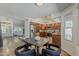 Dining area offering open concept design with a view of the kitchen and living room at 656 W Devon Ct, Gilbert, AZ 85233