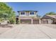 Two-story home with a spacious driveway and a two-car garage at 656 W Devon Ct, Gilbert, AZ 85233
