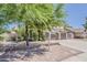 Charming two-story home featuring desert landscaping and a two-car garage at 656 W Devon Ct, Gilbert, AZ 85233