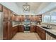 Beautiful kitchen with stainless steel appliances, neutral countertops, and stylish cabinetry at 656 W Devon Ct, Gilbert, AZ 85233