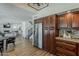 Open concept kitchen with stainless steel appliances, natural light, and view of living room at 656 W Devon Ct, Gilbert, AZ 85233