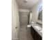Bathroom features a walk-in shower and granite vanity at 6605 N 46Th Ln, Glendale, AZ 85301