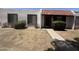 A quaint home showcases a tile roof with desert landscaping at 6605 N 46Th Ln, Glendale, AZ 85301