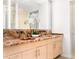 Elegant bathroom features a double sink with a marble countertop and modern fixtures at 7117 E Rancho Vista Dr # 1012, Scottsdale, AZ 85251