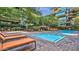 Inviting community pool area featuring lounge chairs and well maintained landscaping at 7117 E Rancho Vista Dr # 1012, Scottsdale, AZ 85251