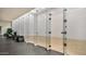 Modern racquetball court with glass doors and ample space for recreational activities at 7117 E Rancho Vista Dr # 1012, Scottsdale, AZ 85251