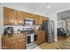 Modern kitchen with stainless steel appliances and sleek countertops at 7305 W Darrel Rd, Laveen, AZ 85339