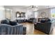 Spacious living room featuring tile floors, modern furnishings, and neutral tones at 7305 W Darrel Rd, Laveen, AZ 85339