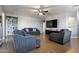 Inviting living room with comfortable seating, tile floors, and neutral tones at 7305 W Darrel Rd, Laveen, AZ 85339