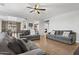 Bright living room featuring tile floors and neutral decor at 7305 W Darrel Rd, Laveen, AZ 85339