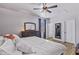 Serene main bedroom featuring ample natural light and a ceiling fan at 7305 W Darrel Rd, Laveen, AZ 85339
