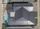 Bird's-eye view of a modern home with sleek roofing, complemented by a luxurious backyard pool and spa at 8503 S 9Th Dr # 17, Phoenix, AZ 85041