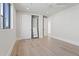 Bedroom featuring sliding closet door and hardwood floors at 8503 S 9Th Dr # 17, Phoenix, AZ 85041