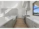 Modern kitchen with custom cabinets, hardwood floors, and an abundance of counter space for gourmet creations at 8503 S 9Th Dr # 17, Phoenix, AZ 85041