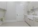 Bright laundry room with a farmhouse sink, and ample counter space at 8503 S 9Th Dr # 17, Phoenix, AZ 85041