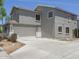Spacious three-car garage and wide driveway offer ample parking and convenient access at 8723 E Kiowa Ave, Mesa, AZ 85209