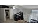 Bedroom with closet, carpet flooring, a dresser, and a desk setup at 8902 E Baltimore St, Mesa, AZ 85207