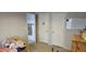 Comfortable bedroom featuring carpet, a window, and two closets for ample storage at 8902 E Baltimore St, Mesa, AZ 85207