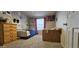 Cozy bedroom featuring carpet, a window and a matching wood dresser and bedframe at 8902 E Baltimore St, Mesa, AZ 85207