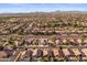 Wide aerial shot highlights this home's location in a Gathering-friendly neighborhood, with easy access to amenities at 9632 E Olla Ave, Mesa, AZ 85212