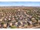 Property aerial view shows community landscape, pools, and neighboring homes, offering a great sense of place at 9632 E Olla Ave, Mesa, AZ 85212