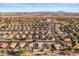Property aerial shot highlighting the location in a mature community with a pool, plus neighborhood features at 9632 E Olla Ave, Mesa, AZ 85212
