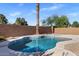 Sparkling backyard pool with decorative tile and a tranquil setting, perfect for enjoying sunny days at 9632 E Olla Ave, Mesa, AZ 85212